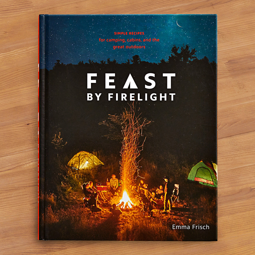 "Feast by Firelight: Simple Recipes for Camping, Cabins, and the Great Outdoors" by Emma Frisch